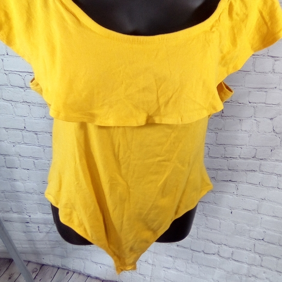 Ambiance Tops - Yellow off shoulder bodysuit.